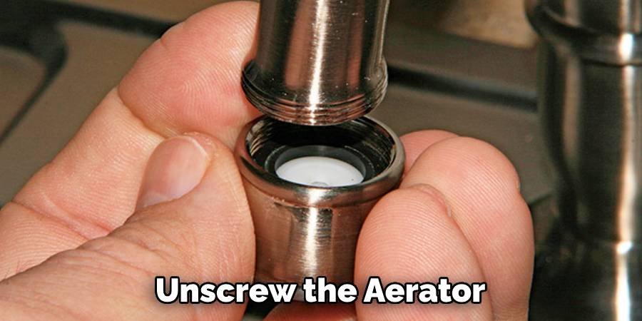 Unscrew the Aerator