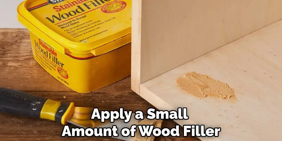 Apply a Small Amount of Wood Filler