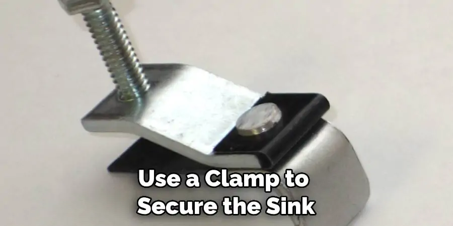 Use a Clamp to Secure the Sink