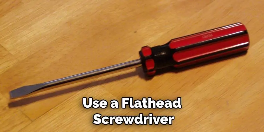 Use a Flathead Screwdriver