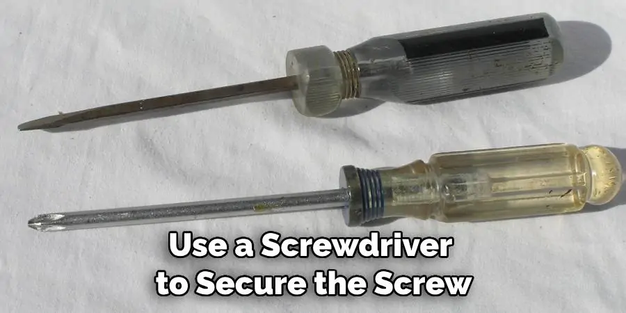 Use a Screwdriver to Secure the Screw