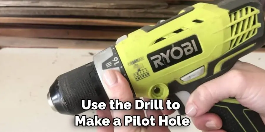 Use the Drill to Make a Pilot Hole