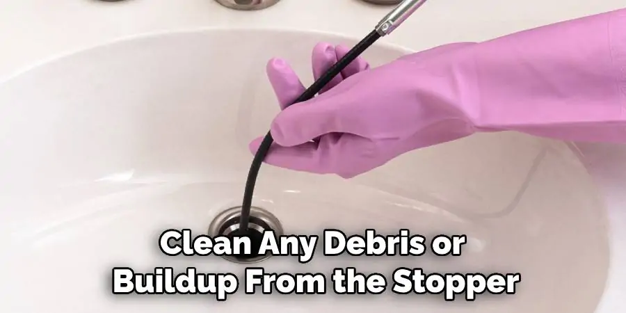 Clean Any Debris or Buildup From the Stopper