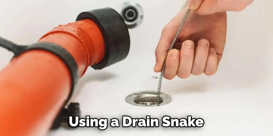 Using a Drain Snake