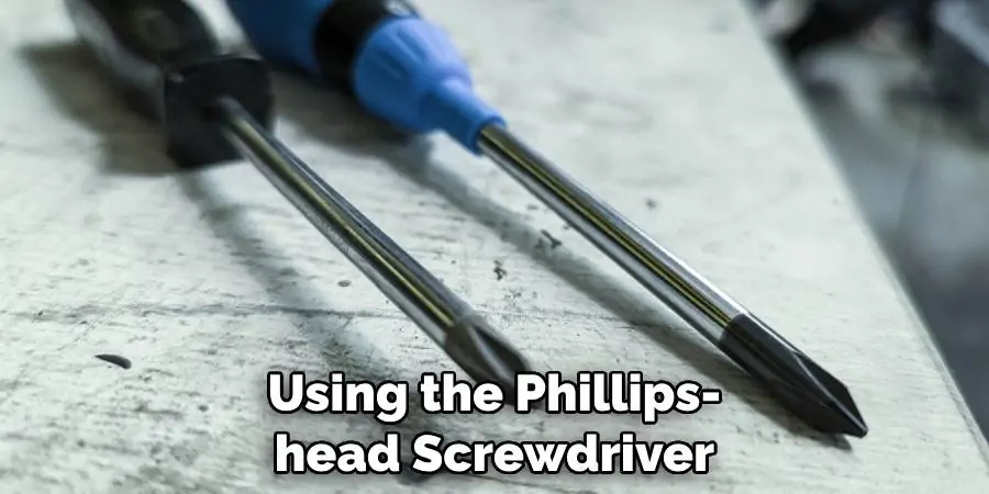 Using the Phillips-head Screwdriver