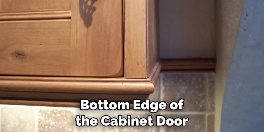 Bottom Edge of the Cabinet Door